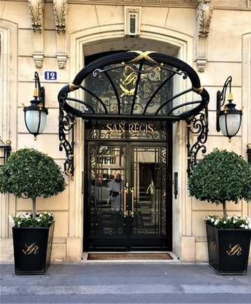 The gilded Art Nouveau entrance of the San Regis hotel in Paris — an emblem of durable, long-held luxury hospitality